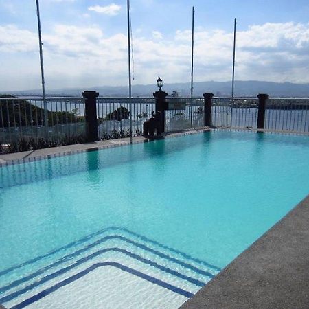 Hotel Cesario Мактан Екстериор снимка