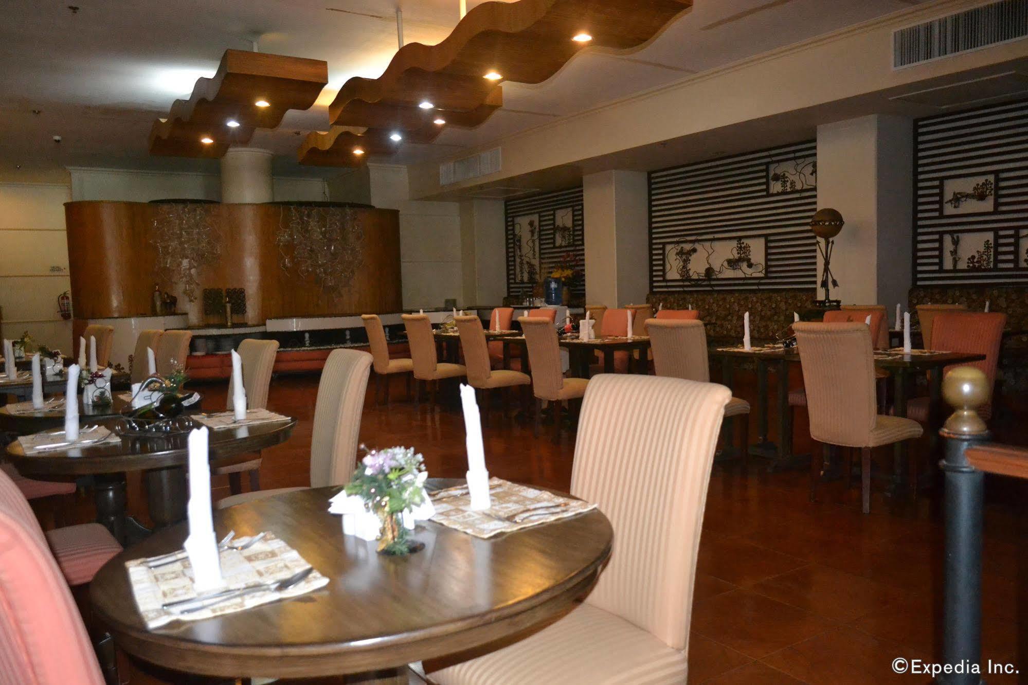 Hotel Cesario Мактан Екстериор снимка